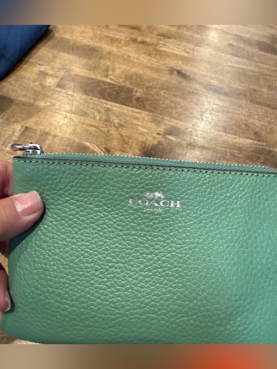 Coach Handbags - Coach Green Pebbled Leather Wristlet with Silver Logo